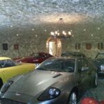 Stone underground garage with plaques hung on the walls - Art Hangers